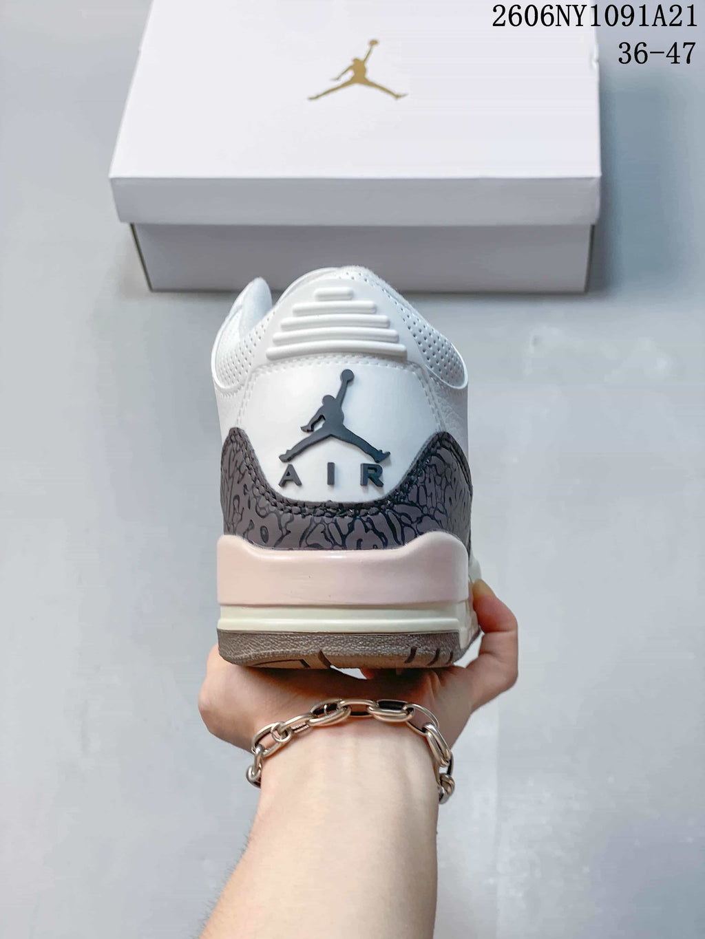 Rear view showing the dark patterned heel panel and Jumpman logo