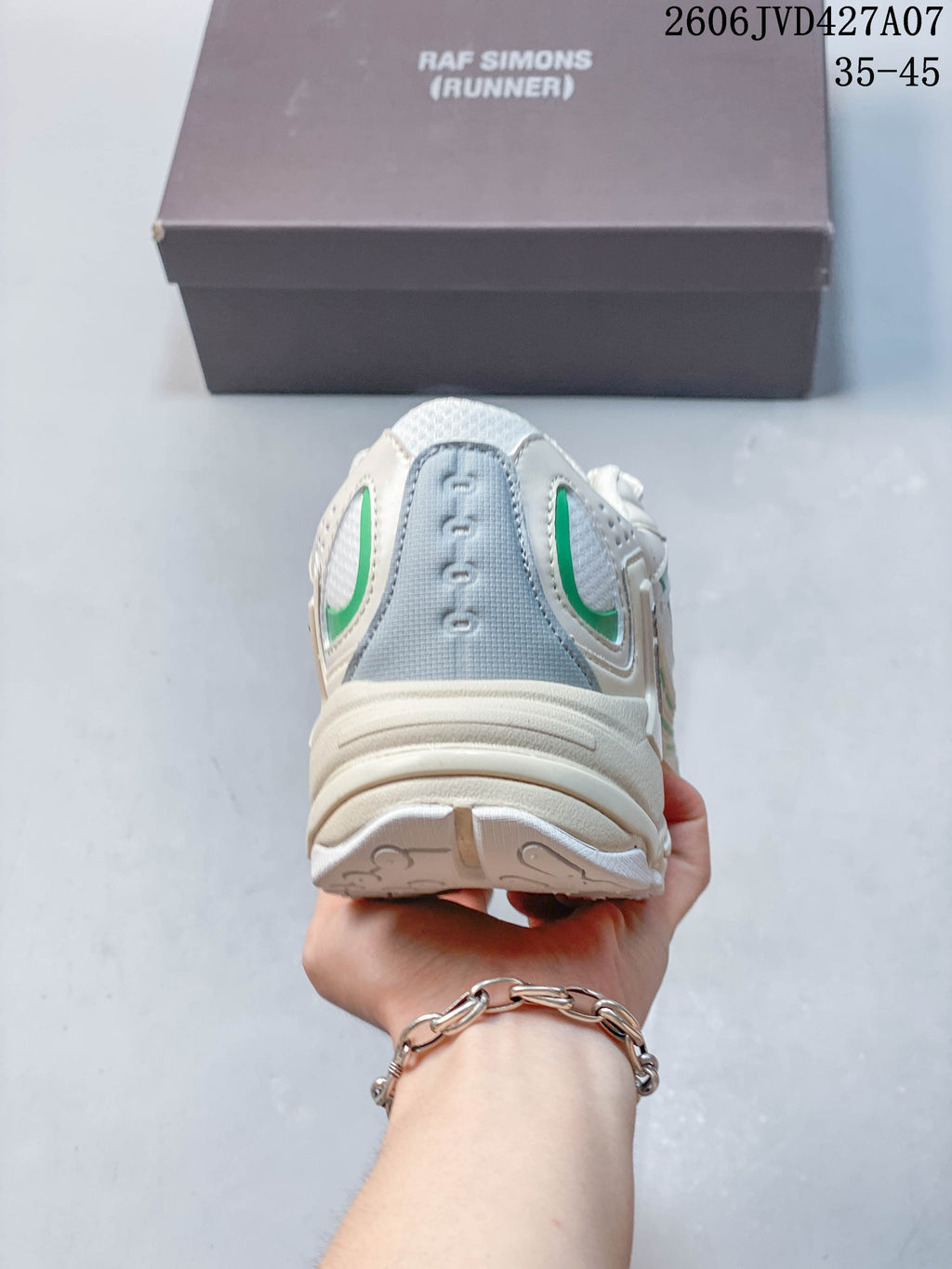 Rear view of the sneaker showing its heel panel and sculpted sole