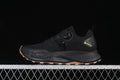 Side view of a black The North Face Vectiv Enduris Low shoe with tan-toned outsole lugs.