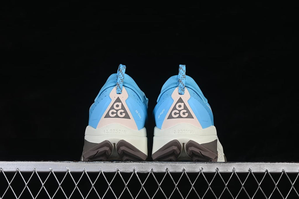 Rear view of the pair highlighting the heel graphics and lugged outsole.