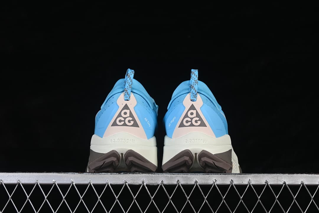 Rear view of the pair highlighting the heel graphics and lugged outsole.