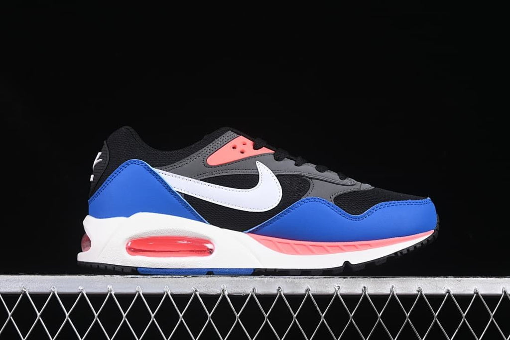 Side profile showing the white midsole and coral-colored heel Air unit