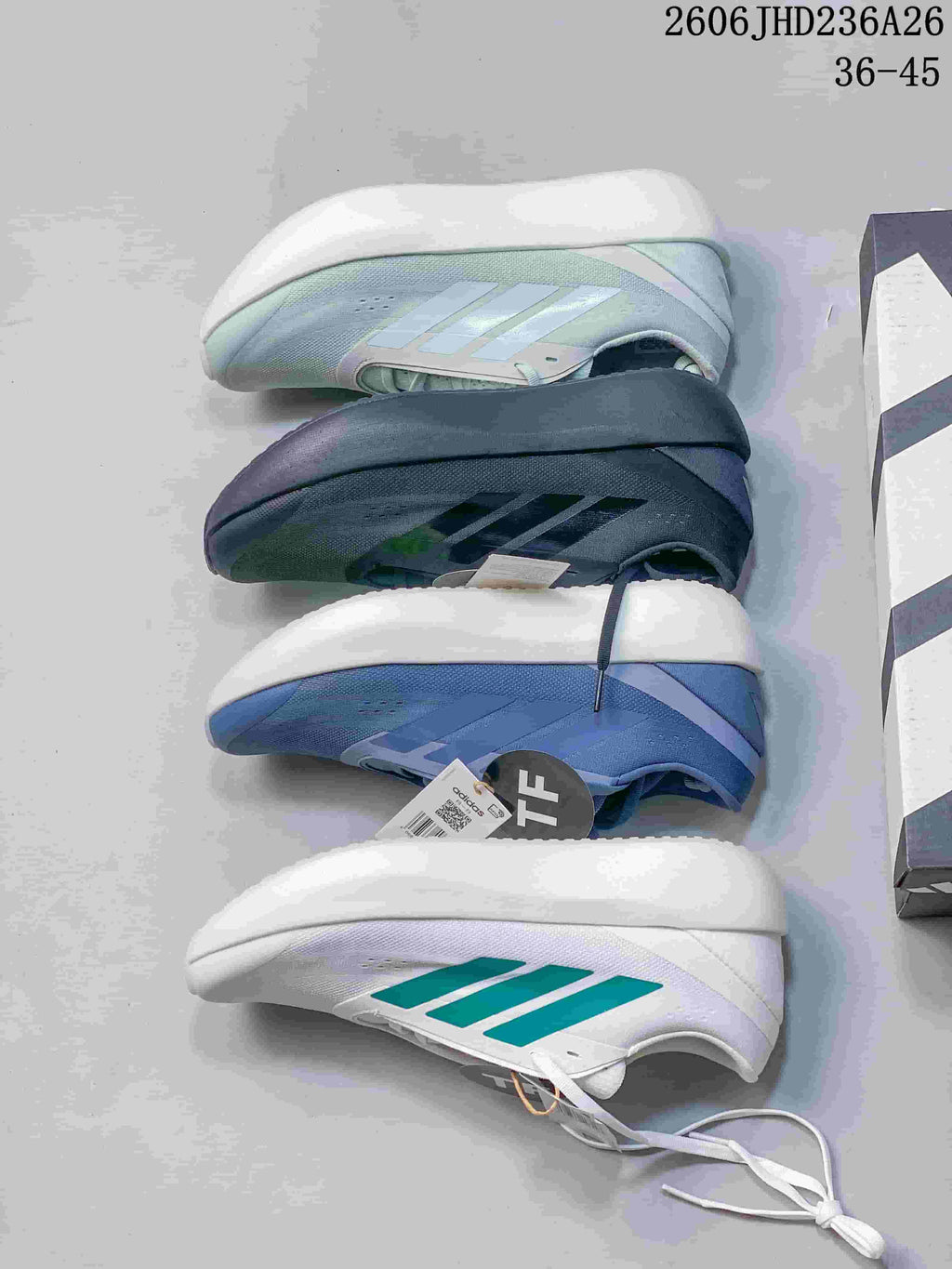 Four adidas ZENBOOST shoes displayed from the side in different colorways.