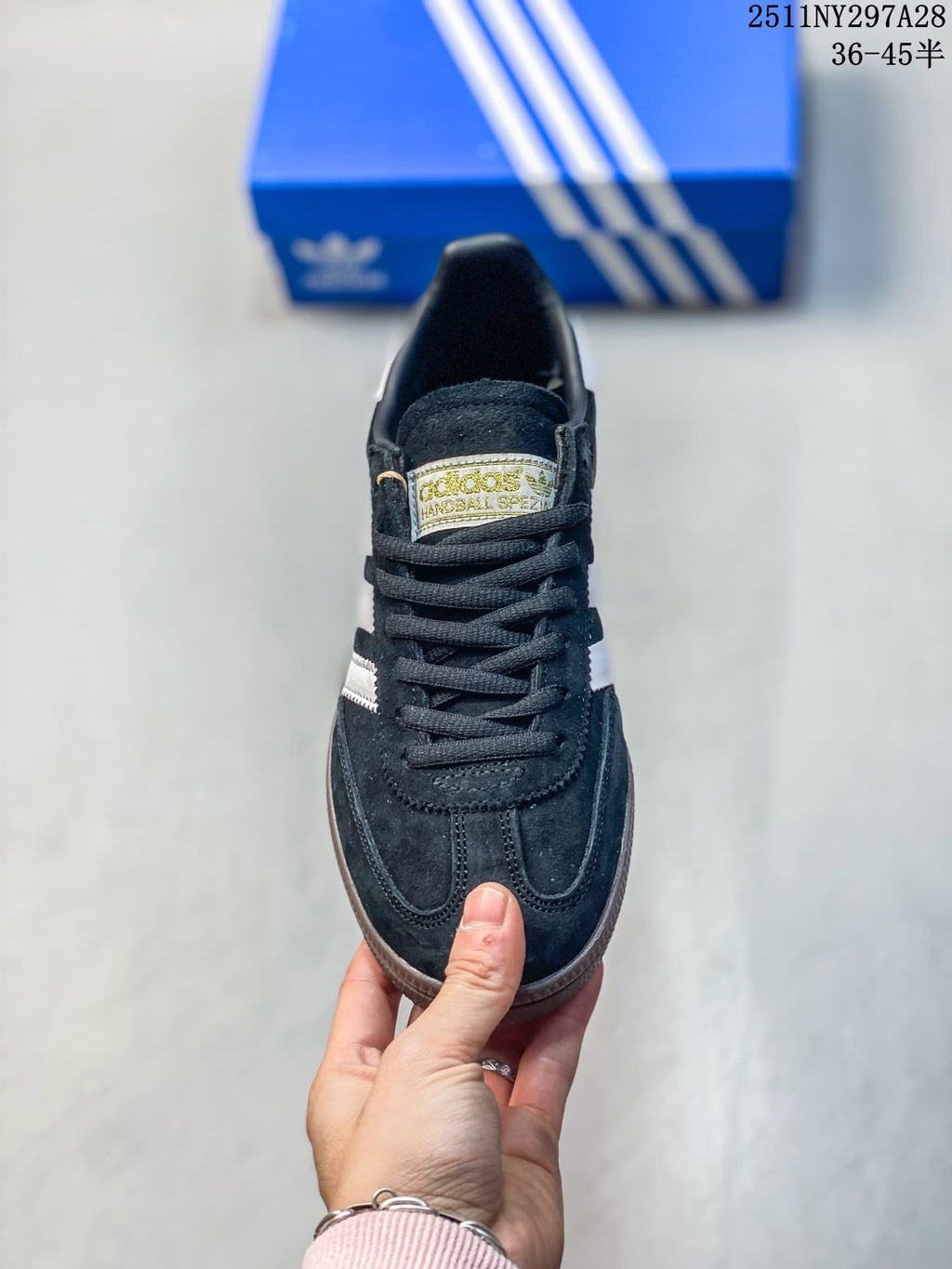 Front view of the dark lace-up Adidas Handball Spezial sneaker.
