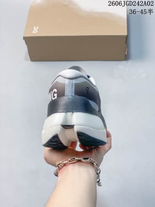 Rear view of the ON Cloudboom Max shoe showing the heel structure and outsole sections.