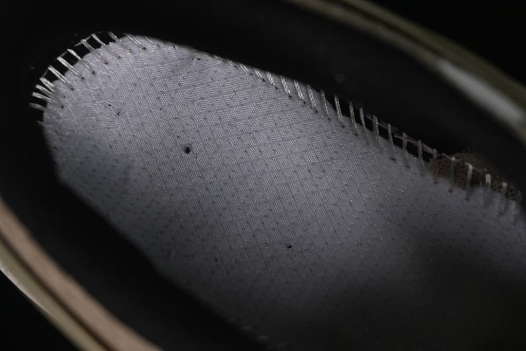 Close-up of the shoe interior and stitched lining