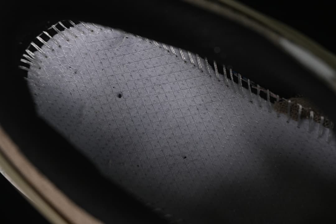 Close-up of the shoe interior and stitched lining