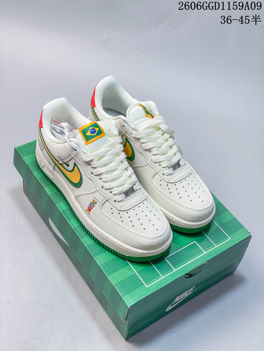 Pair of white low-top sneakers with green and yellow accents on a green graphic box; image overlay reads 36–45.5.