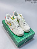 Pair of white low-top sneakers with green and yellow accents on a green graphic box; image overlay reads 36–45.5.