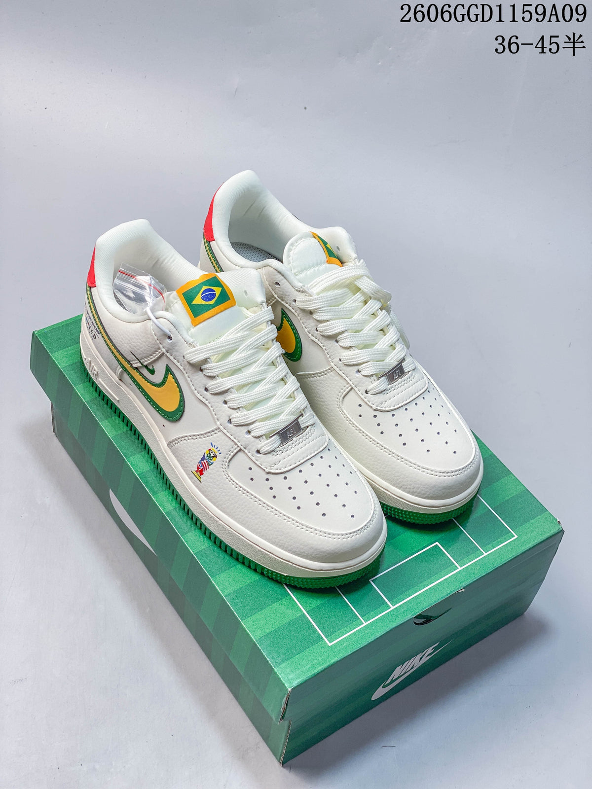 Pair of white low-top sneakers with green and yellow accents on a green graphic box; image overlay reads 36–45.5.