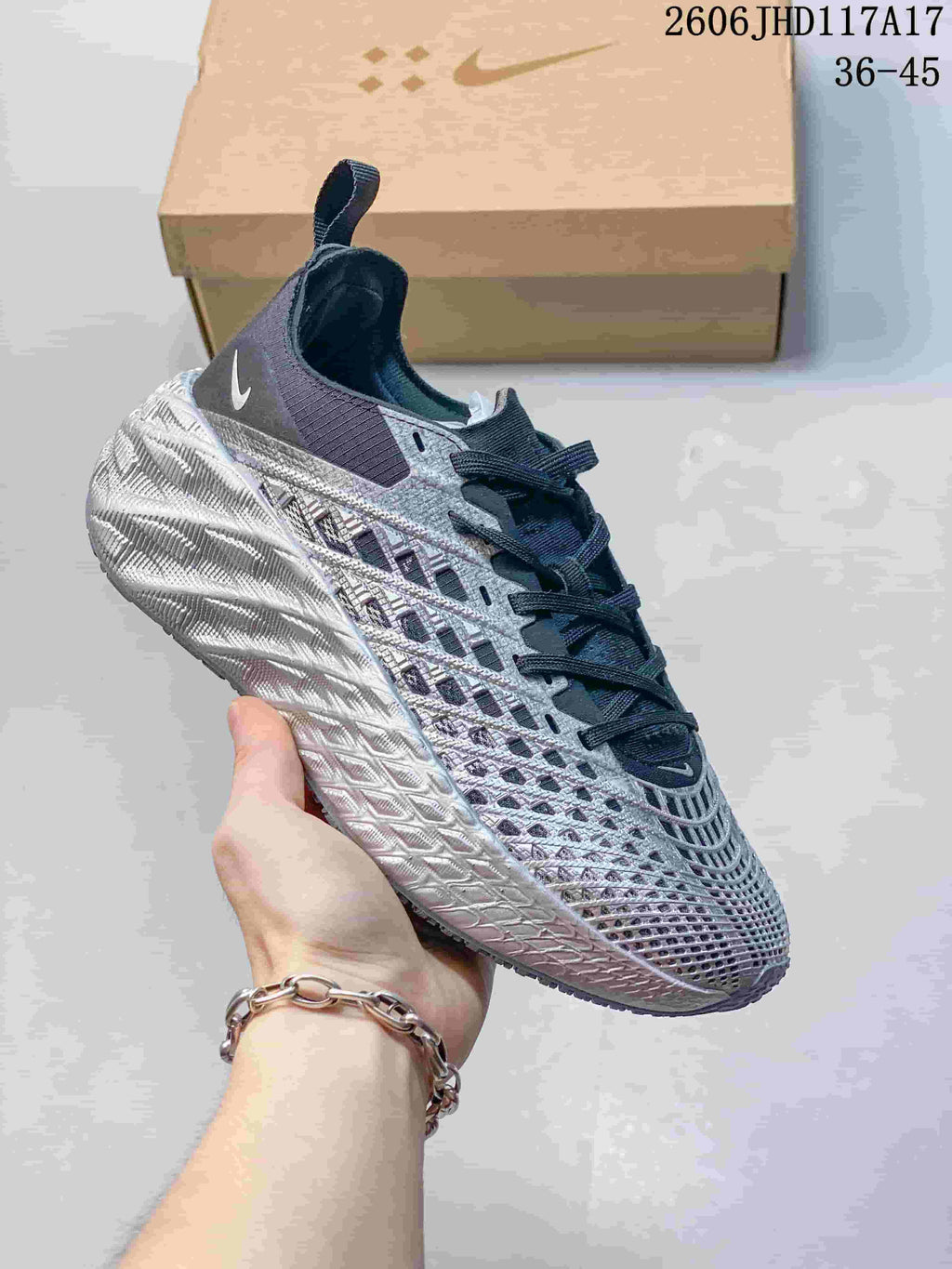 Light gray and purple Nike Ava Rover Hs sneaker with a textured sole