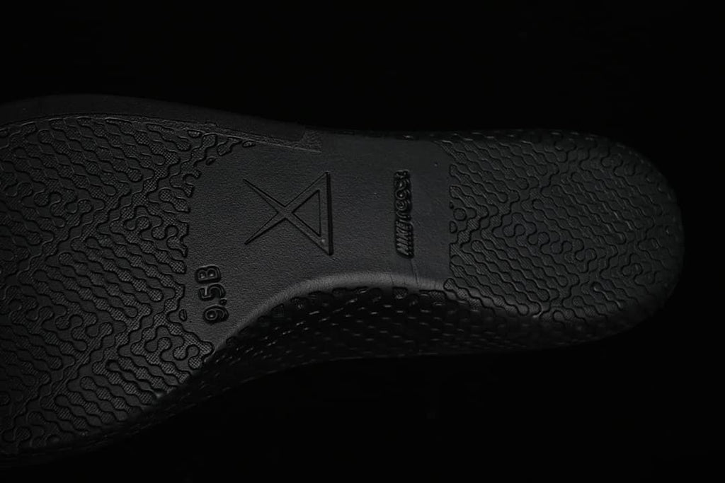 Close-up of the black outsole on a Nike Kobe 8 Protro shoe.