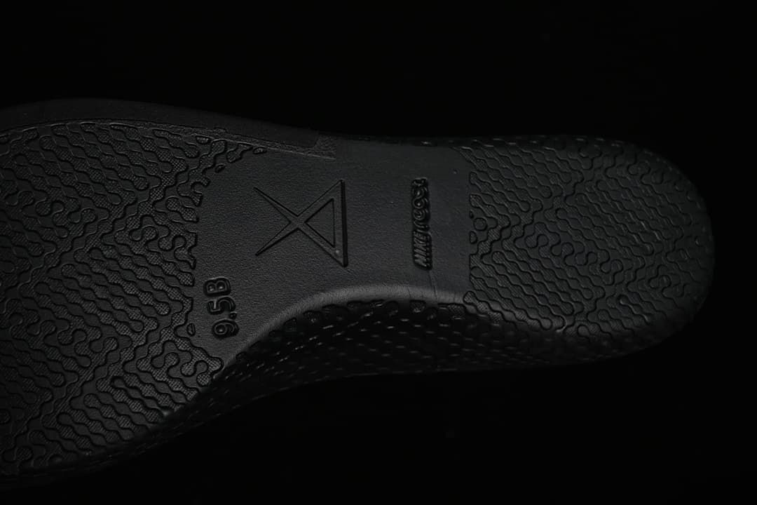 Close-up of the black outsole on a Nike Kobe 8 Protro shoe.