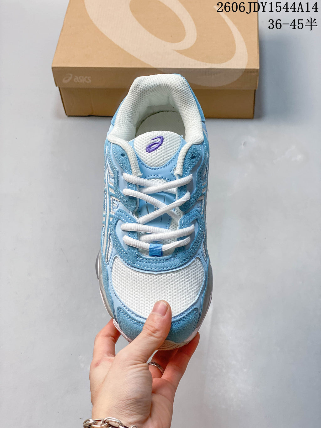 Top view highlighting the laces and mesh-look toe panel.