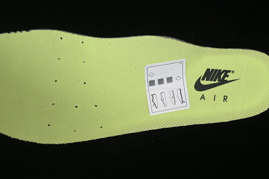 Volt-colored insole with Nike Air branding.