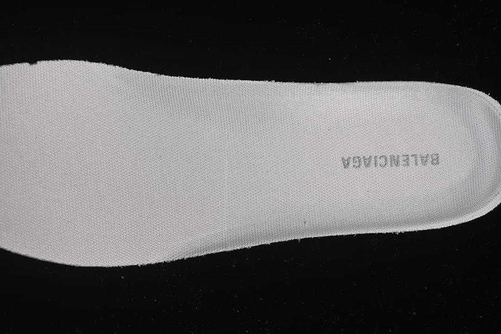 Close-up of the textured insole with Balenciaga branding.