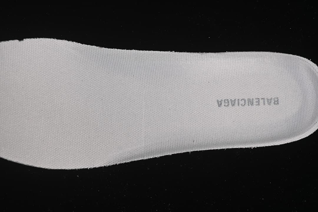 Close-up of the textured insole with Balenciaga branding.