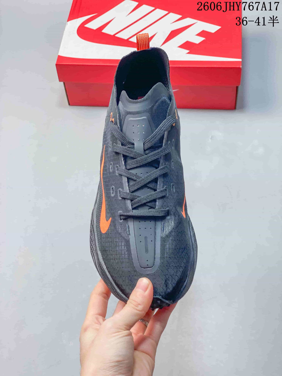 Front view showing the lace-up closure and textured upper of a Nike Ava Rover sneaker.