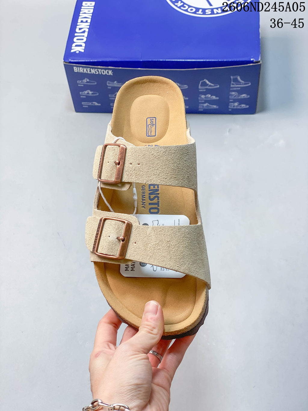 Top view of the sandal showing its two adjustable buckles and open toe.