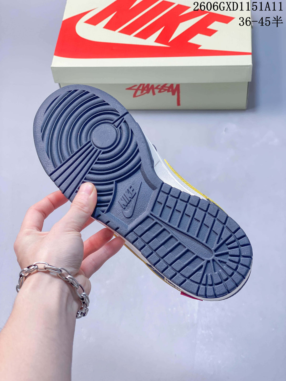 Close-up of the navy outsole and circular tread pattern