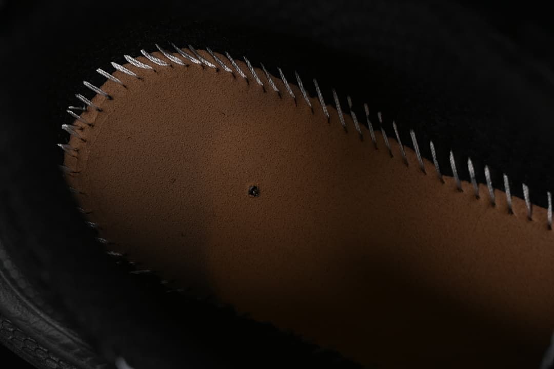 Close-up of the insole and interior stitching.
