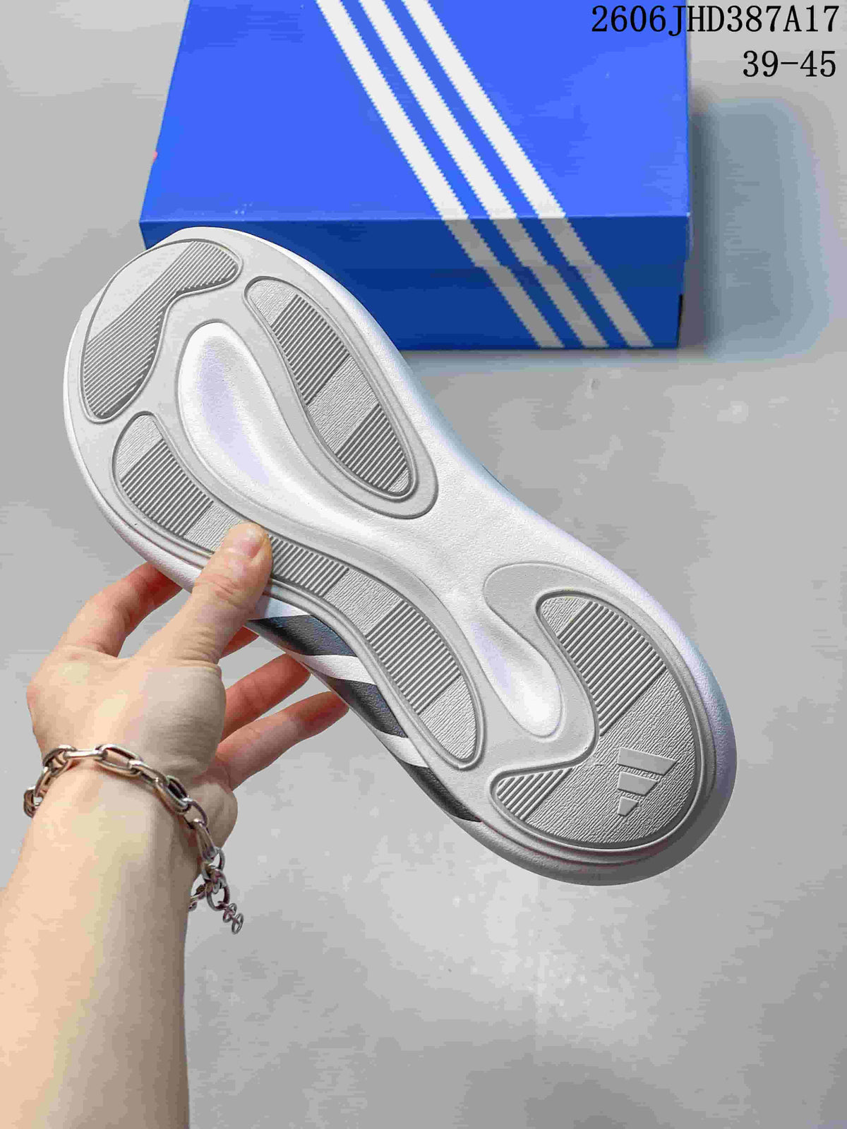 Close-up of the patterned outsole on a white adidas Purechill V2 sneaker.