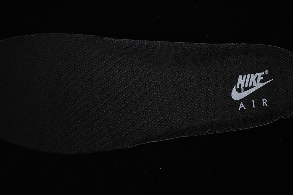 Close-up of a black insole with Nike Air branding