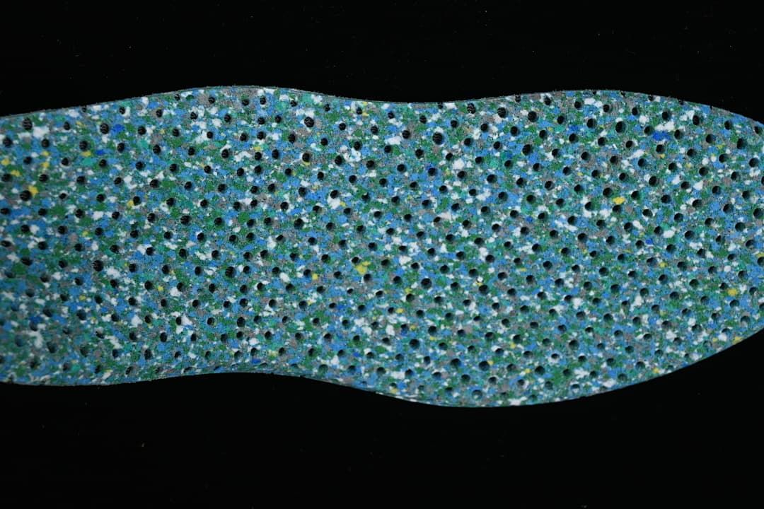 Close-up of a blue-toned textured shoe insert.
