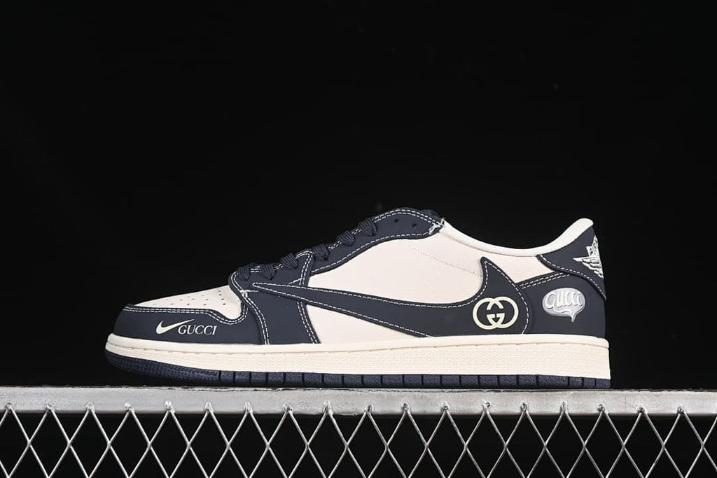 Side view of an off-white and dark navy low-top sneaker with contrast stitching and visible swoosh and Gucci-style details.