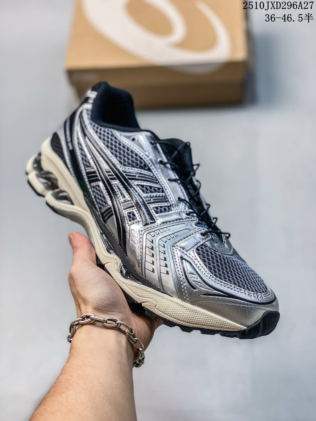Silver and black mesh running sneaker with a sculpted sole.