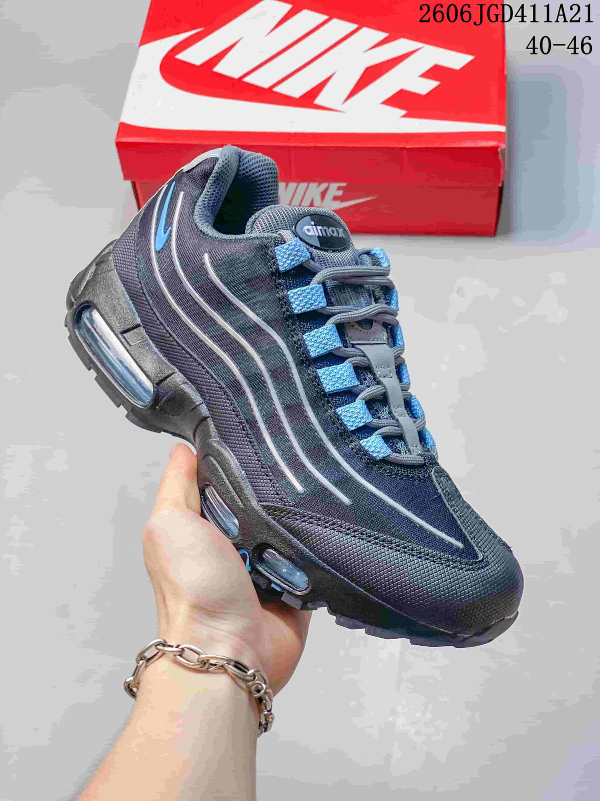 Side view of a dark Air Max 95 sneaker with blue accents and visible sole air units