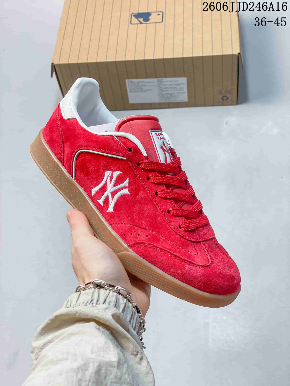 Close-up of a red New York Yankees sneaker with white side graphics and a gum-colored sole.