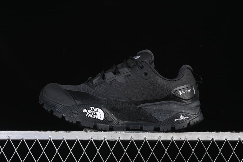 Black The North Face Summit Offtrail low-top hiking shoe shown from the side