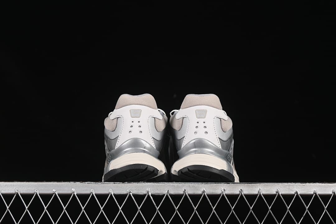 Rear view of the pair showing the heel counters and outsoles.