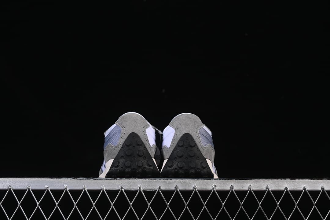 Rear view of the pair showing the black outsole heels.