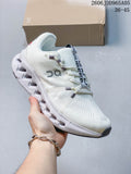 Off-white On Cloudsurfer Trail shoe with a sculpted white sole