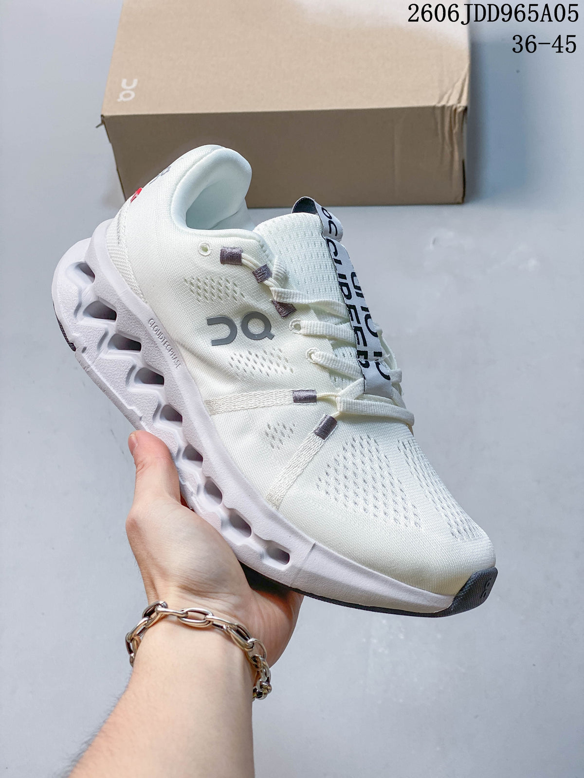 Off-white On Cloudsurfer Trail shoe with a sculpted white sole