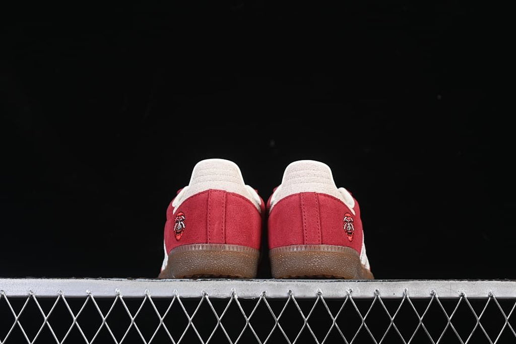 Rear view showing heel panels and embroidered graphics