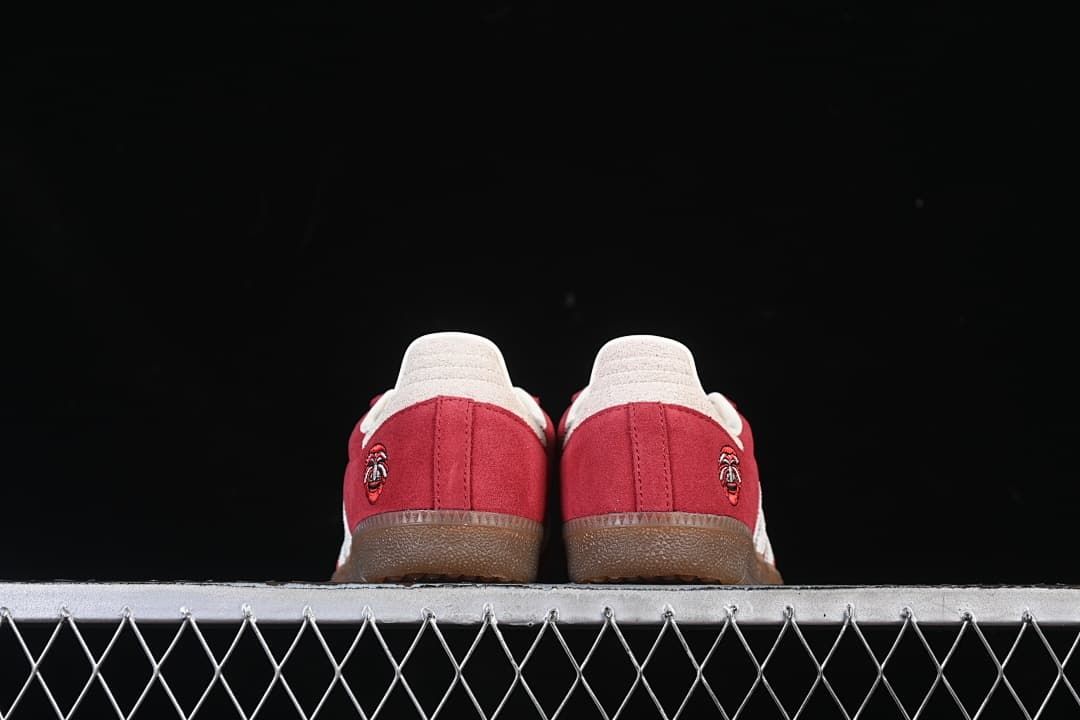 Rear view showing heel panels and embroidered graphics