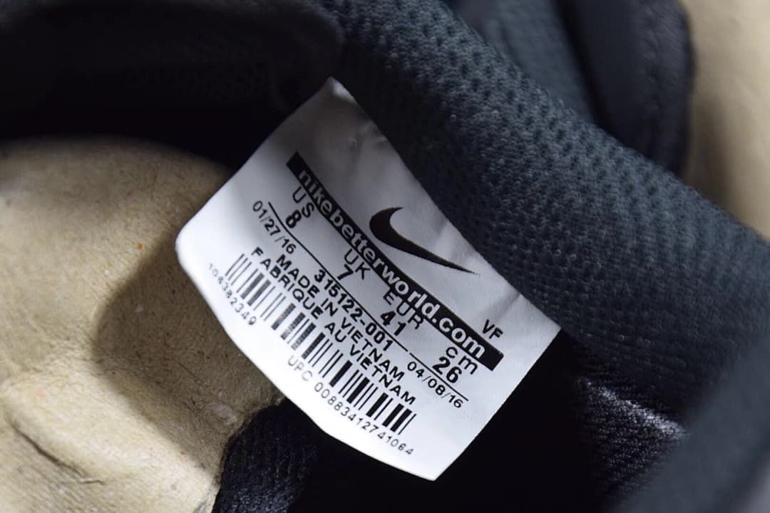 Interior shoe label showing style code 315122-001 and size markings