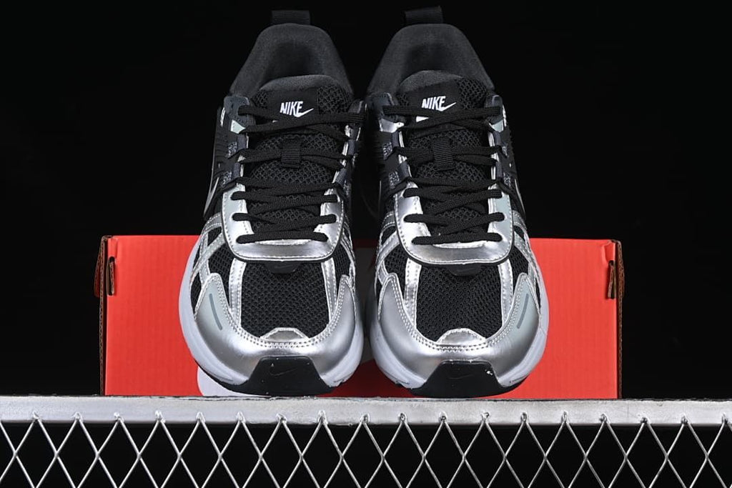 Front view of the pair displayed on a red shoebox