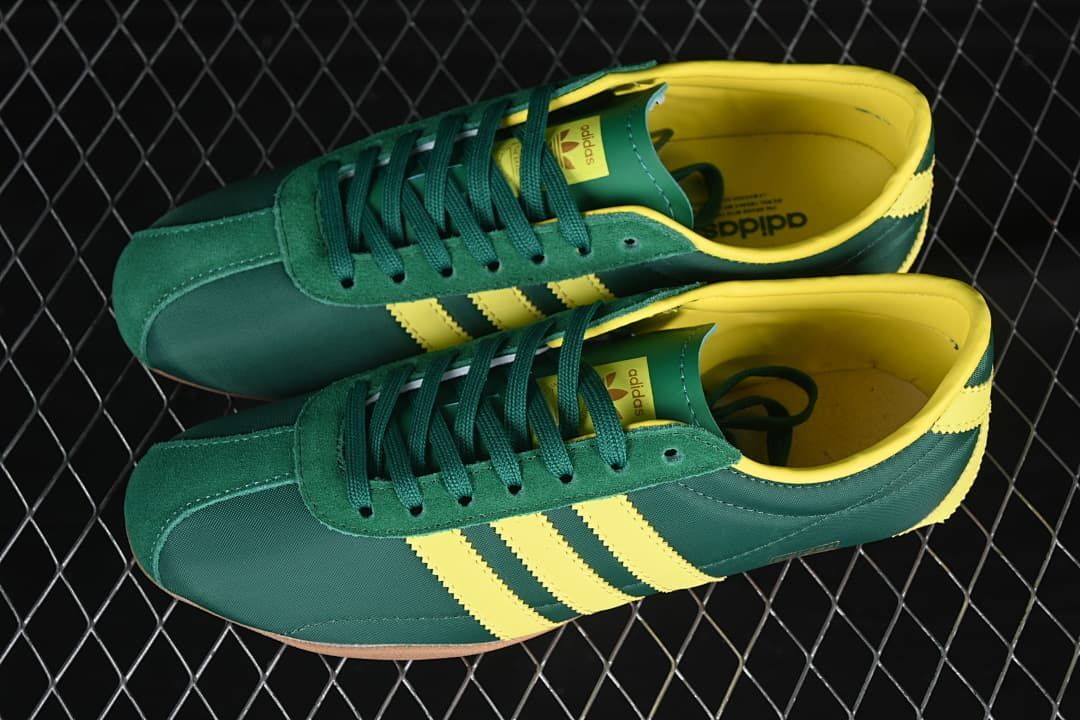 Pair of green and yellow adidas Tokyo W sneakers viewed from above