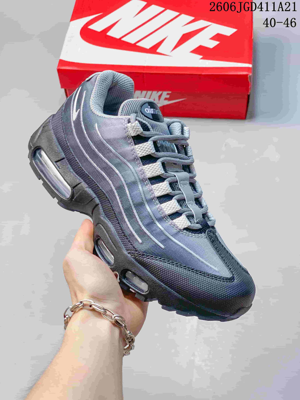 Angled side view of a grey Nike Air Max 95 sneaker