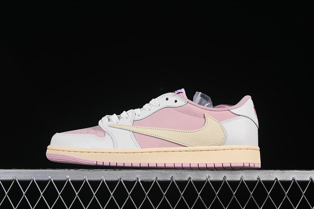 Side profile of pink, white, and sail low-top Jordan 1 sneakers