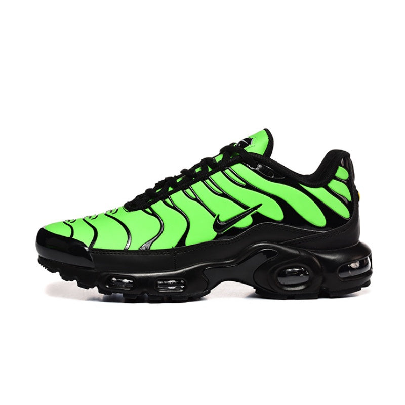 Bright green and black Nike Air Max Plus sneaker with visible air units.