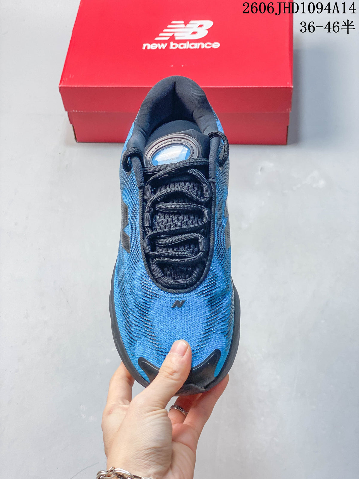 Top view of the blue shoe with dark laces and a rounded toe