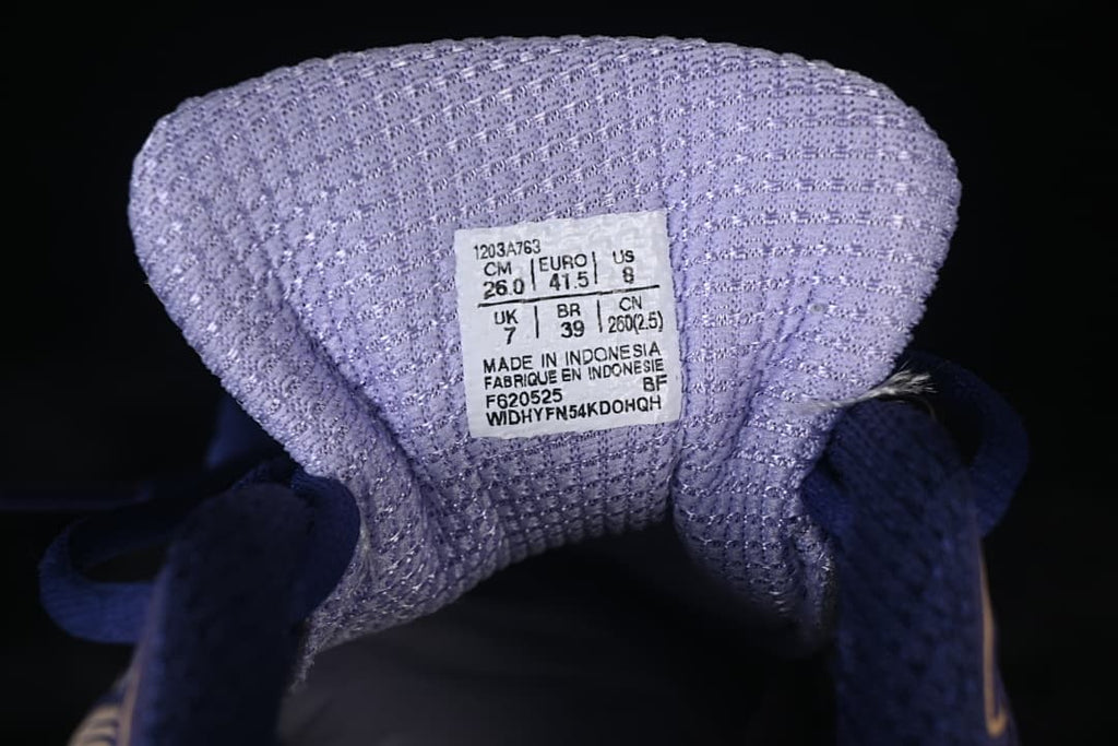 Tongue label showing model 1203A763 and photographed size details.
