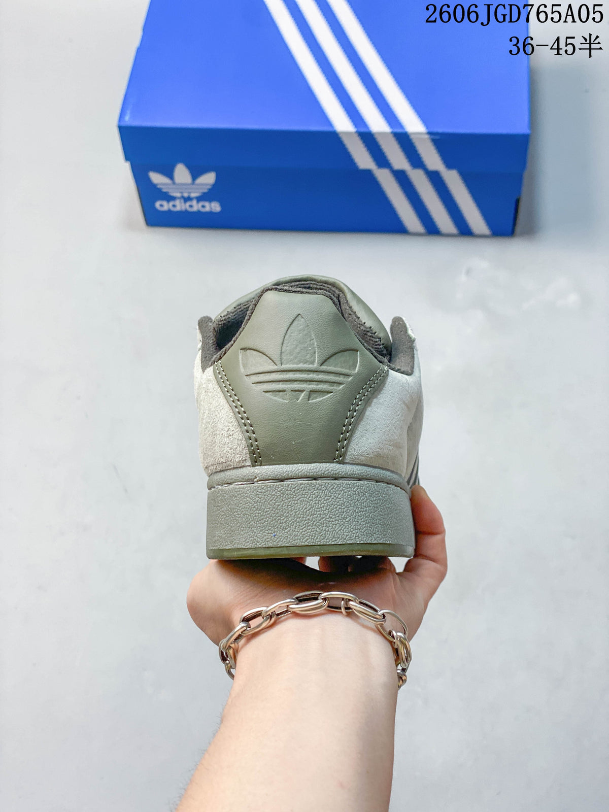Rear view of an Adidas Originals Superstar XLG sneaker showing its raised olive heel sole