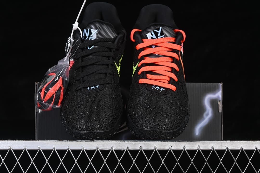 Front view of the pair showing contrasting lace colors and patterned toe areas.