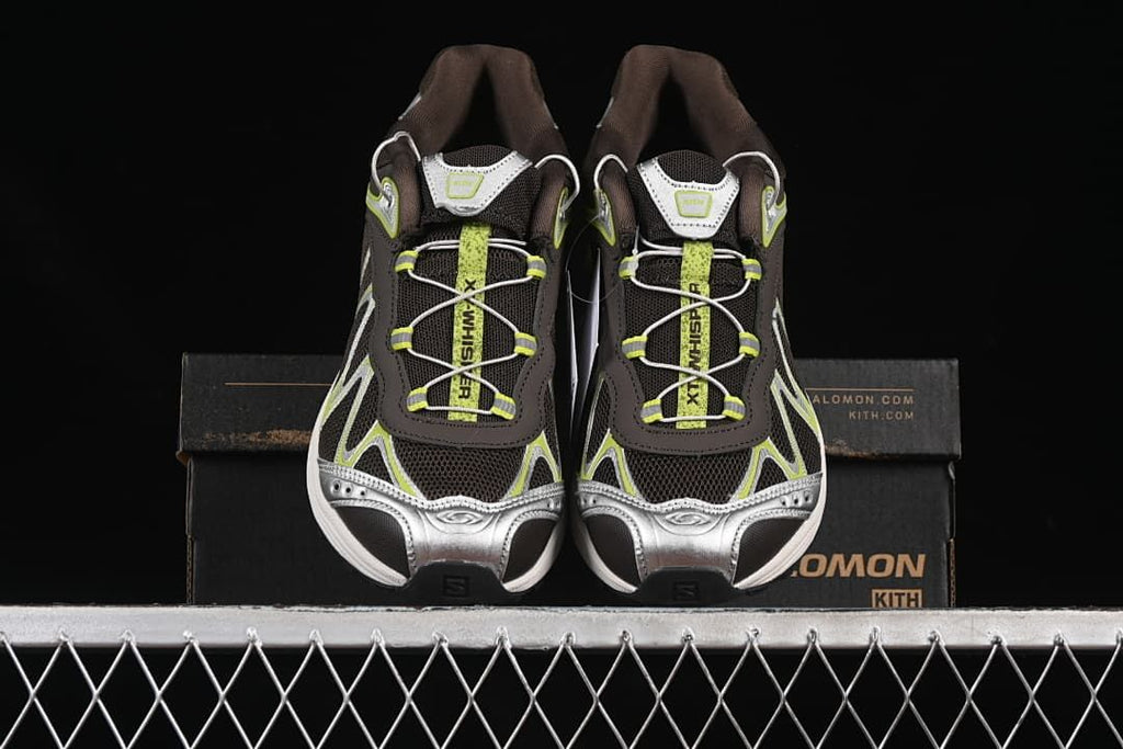 Front view of the pair showing lime-accented lacing and silver toe panels
